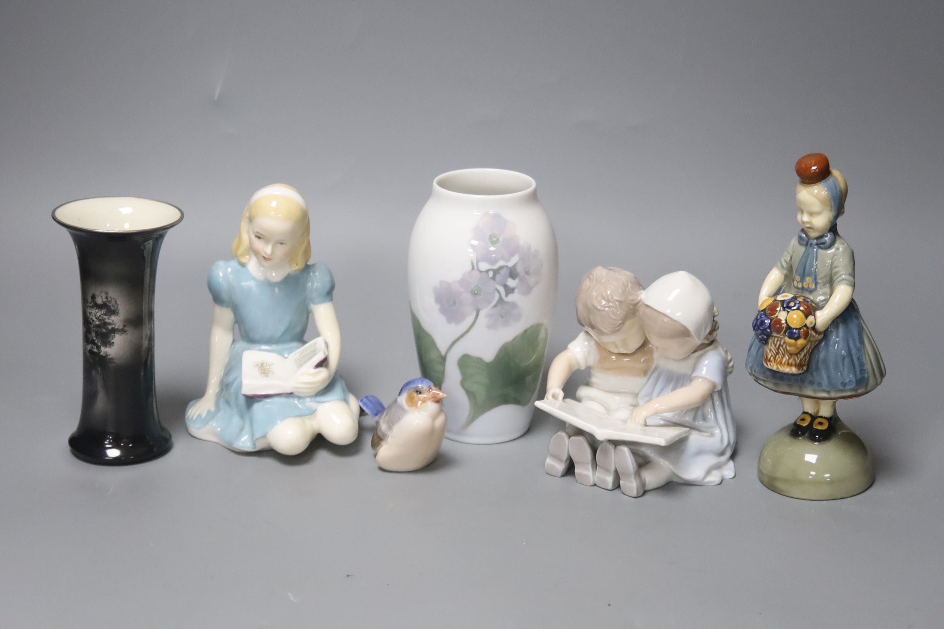 A group of figurines to include Royal Copenhagen, Doulton etc., a Royal Copenhagen vase and a Royal Worcester vase, 16cm